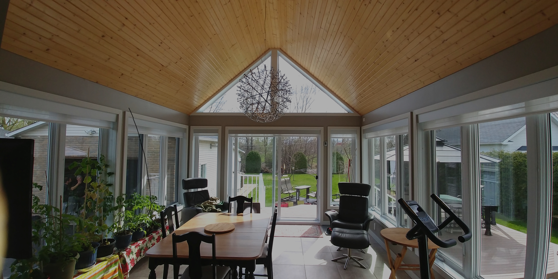 Solarium 4 saisons isolé avec vitrage haut rendement